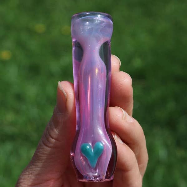 Girly purple color changing glass smoking pipe by Sarita Glass