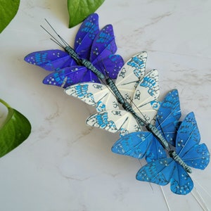 6  3" assorted Blue Feather Butterflies on wire for floral arrangements - cake topper-hat accents- costumes-home decor