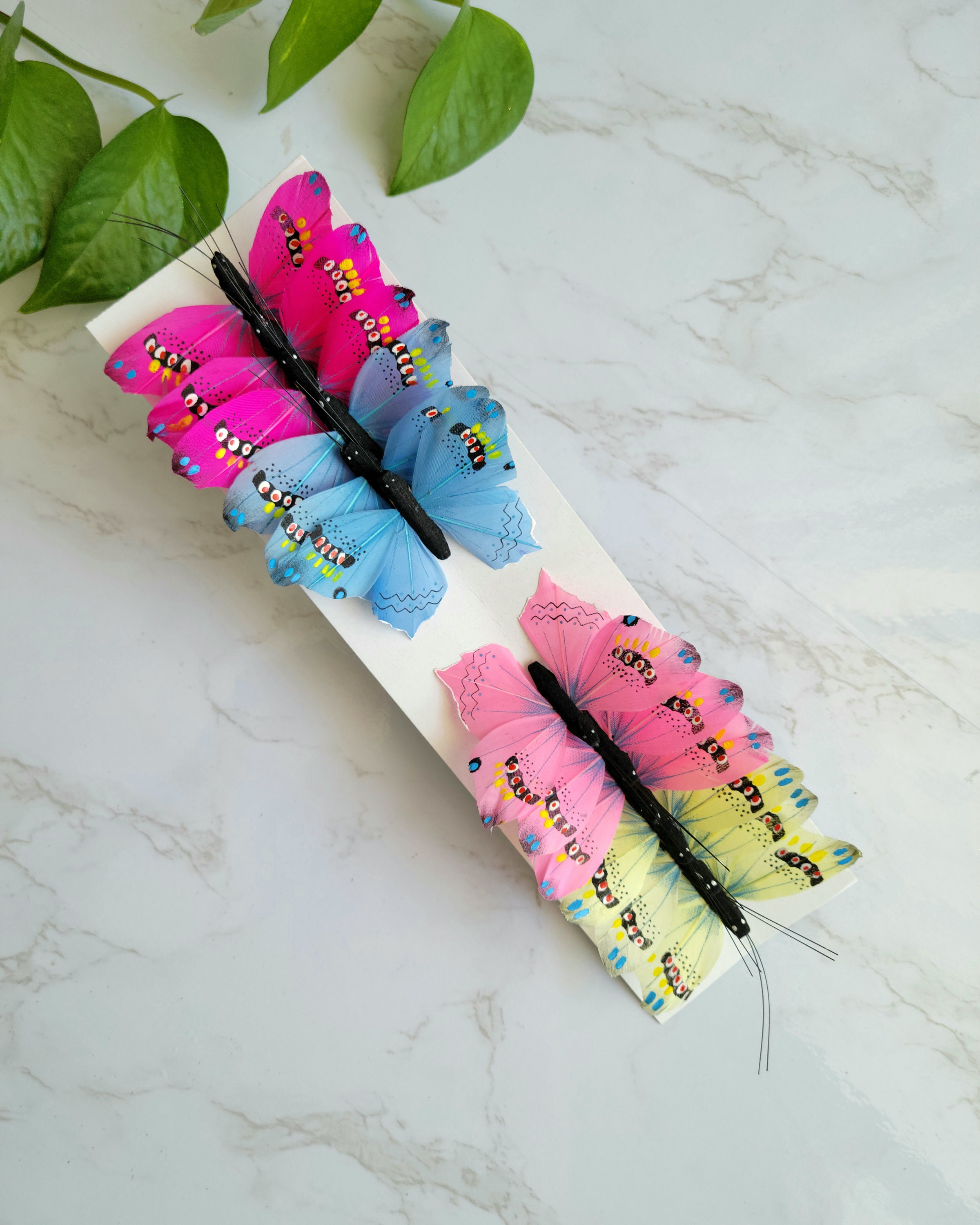 12 mariposas multicolores de plumas de monarca de 4 en alambre para  arreglos florales-decoración de hogar y jardín-Topper de pastel Artesanías  sombrero -  México
