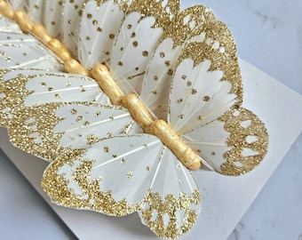 12 jolis papillons en plumes pailletées en or blanc de 4" sur fil pour gâteaux, mariages, maison, décorations florales