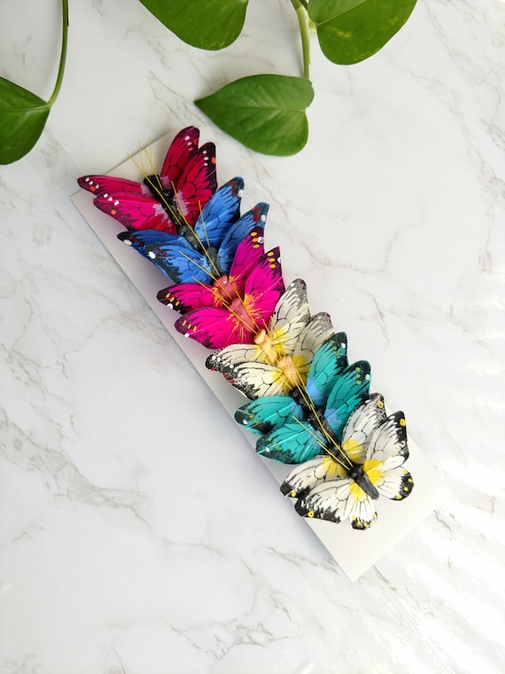 12 mariposas multicolores de plumas de monarca de 4 en alambre para  arreglos florales-decoración de hogar y jardín-Topper de pastel Artesanías  sombrero -  México