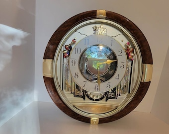 Seiko Melodies In Motion Swarovski Wall Clock *  Castle and Trumpeting Angels * Round * Convex Glass Frame * WESTMINSTER CHIME