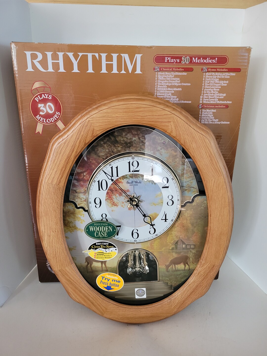NIB New World Rhythm Magic Motion Wall Clock Model 4MH429 Joyful Sunset