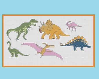 May include: A cross-stitch pattern featuring seven different dinosaurs in various colors. The dinosaurs include a green T-Rex, a yellow Triceratops, a pink Parasaurolophus, a green Brontosaurus, a pink Pterodactyl, a blue Stegosaurus, and a green dinosaur.