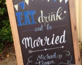 Eat, drink and Be married chalkboard sign.