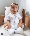 Linen Baptism bubble romper outfit with optional embroidery customisation and hat, bonnet, shoes, bunny keepsake product logo