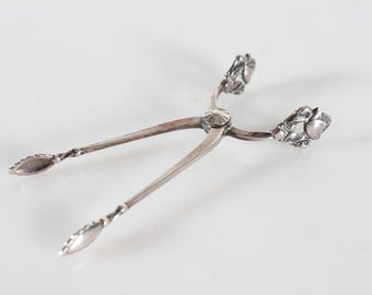 Danish Georg Jensen Art Nouveau Acorn Sterling Silver Cutlery by Johan Rode 1915. Sugar Pliers 9.5 cm. With Stamp From the period 1930-45