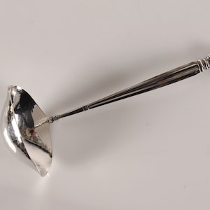 Danish Georg Jensen Art Nouveau Acorn Sterling Silver Cutlery by Johan Rode 1915. Sauce Ladle 20 cm. With Stamp from the period after 1945