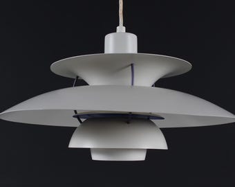 Poul Henningsen Dented PH 5 Pendant Light with Off White Shades. Made by Louis Poulsen A/S Denmark in the Mid-century Period 1990s