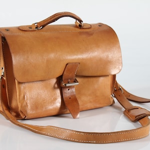 Danish vintage Shoulder School Bag of Cognac Colored Leather with Patina in Strong Quality. Made in the 1970s by a Danish Manufacturer