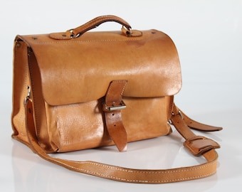 Danish vintage Shoulder School Bag of Cognac Colored Leather with Patina in Strong Quality. Made in the 1970s by a Danish Manufacturer