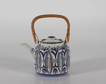 Aluminia / Royal Copenhagen Teapot by Berte Jessen model 437/3151 with Cane Handle and Floral Patten. Made in the 70s in Denmark Mid-century