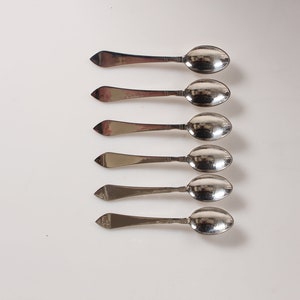 Georg Jensen Arts and Crafts Continental Sterling Silver Cutlery Designed by Georg Jensen 1906. Coffee Spoons L 11 cm, Stamp from 1930-45