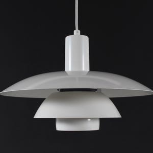 Poul Henningsen PH 4 4 1/2  Pendant light special edition from the 1990s with offwhite shades made by Louis Poulsen A/S in Denmark 1990s