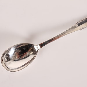 Danish Georg Jensen Art Nouveau Beaded Sterling Silver Cutlery by Georg Jensen 1916. Small Serving Spoon 15.5 cm. From the Period 1915-30