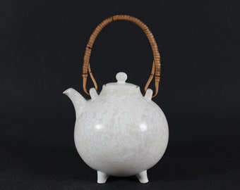 Gunnar Nylund and Rörstrand Ball Shaped Ceramic Teapot with Speckled Sand Colored Glaze and Cane Handle. Made in Sweden in the 1960s