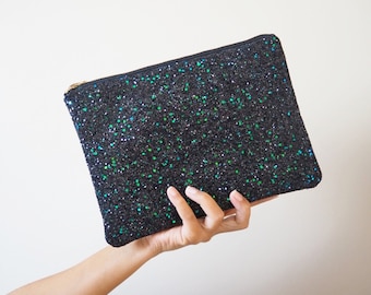 black sparkly clutch bag