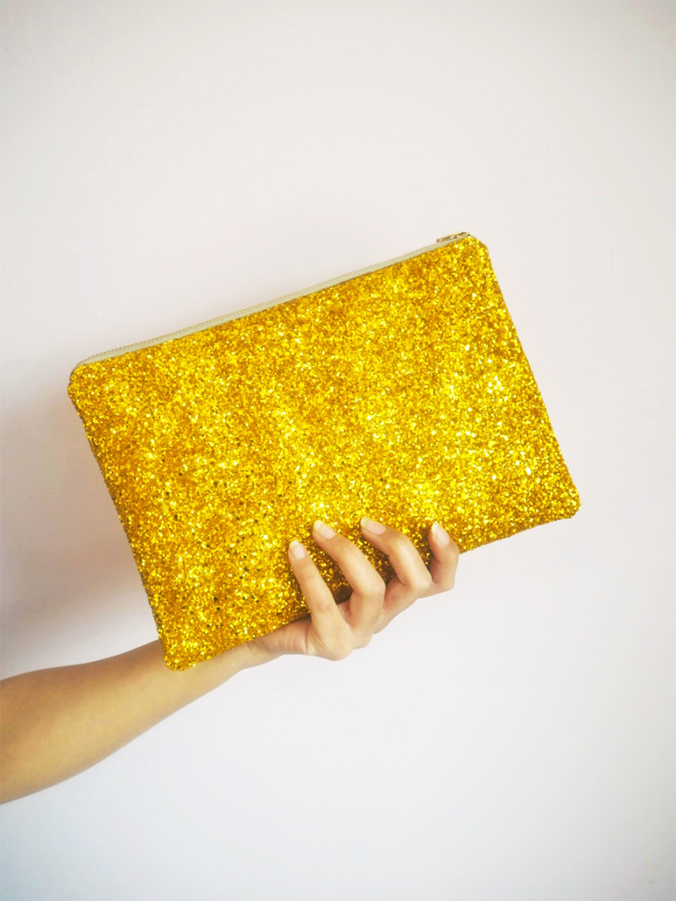 gold sequin clutch bag