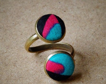 Anillo ajustable simple o doble en telas de cera africanas turquesa y fucsia