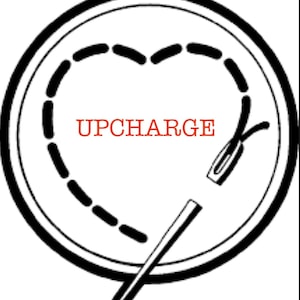 May include: Black and white illustration of a heart with a needle and thread going through it. The word "UPCHARGE" is written in red inside the heart.