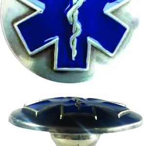 May include: A silver and blue cabinet knob with a star of life design. The star of life is a symbol used by emergency medical services.