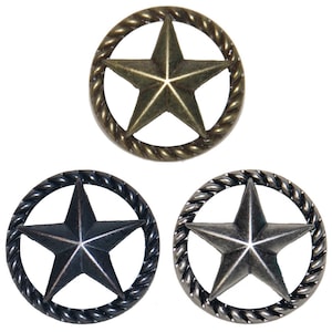 May include: Three metal star-shaped buttons with a rope-like border. The buttons are in gold, silver, and black.