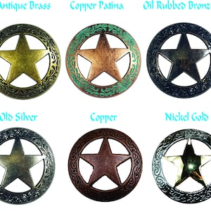 May include: Six different metal star-shaped charms with a decorative border. The charms are in antique brass, copper patina, oil rubbed bronze, old silver, copper, and nickel gold.