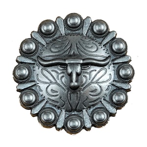 May include: Silver-toned metal belt buckle with a bull's head design and a decorative border of small circles.