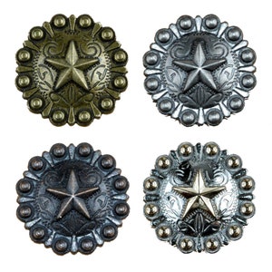 May include: Four metal star conchos with a decorative design. The conchos are in four different finishes: gold, silver, black, and a combination of silver and gold.
