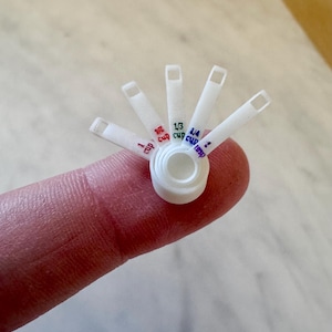 Miniature measuring cups