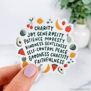 Fruit border with words: Charity, Joy, Generosity, Patience, Modesty, Kindness, Gentleness, Self-Control, Peace, Goodness, Chastity, Faithfulness