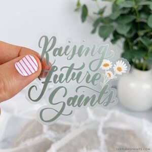 Raising Future Saints Vinyl Sticker, Catholic Mom Gift, Catholic Homeschool, Traditional Catholic Mom, Catholic Woman Sticker image 1