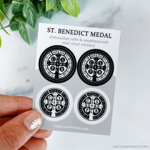 These sticker sheets contain 4 St Benedict medal stickers, in black and white. They are dishwasher safe and weatherproof mini vinyl stickers. This is the pink medal.