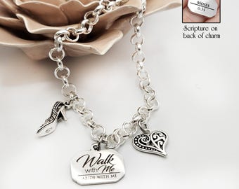 May include: Silver charm bracelet with a high-heeled shoe, a heart, and a charm that says "Walk with Me, Abide with Me." A small charm reads "Moses 6:34" with the text "Scripture on back of charm."