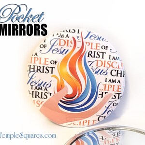 May include: A white compact mirror with a colorful design featuring flames and the words "I am a disciple of Jesus Christ".