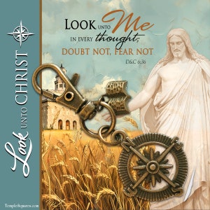May include: A gold-toned keychain with a compass charm and a quote from the Book of Mormon: "Look unto me in every thought; doubt not, fear not." D&C 6:36