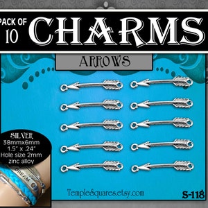 May include: A pack of 10 silver arrow charms, each measuring 1.5 inches by 0.24 inches. The charms have a 2 mm hole for attaching to jewelry or other crafts. The charms are made of zinc alloy and are labeled "S-118".