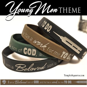May include: Four silicone wristbands with inspirational messages in silver lettering. The bands are black, brown, green, and dark green. The messages are "I am a Beloved son of God", "He has a work for me to do", "To Do", and "I am a son of God".