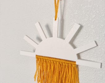 Tapiz de pared estilo boho con forma de sol