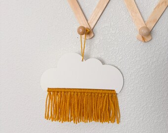 Tapiz de pared estilo bohemio con diseño de nube de hilo.