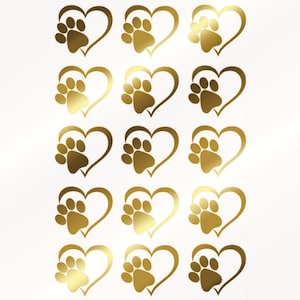 May include: A sheet of fifteen individual stickers arranged in five rows of three. Each sticker features a gold-colored heart outline with a solid gold paw print positioned inside the heart shape, creating a repeating pattern of pet-themed icons.
