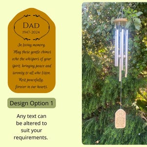 May include: A wooden plaque with the text "DAD 1947-2024" and a message about a wind chime. The plaque is attached to a silver wind chime hanging from a tree branch.