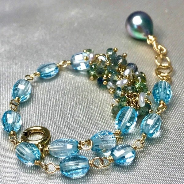 Teal Green Sapphire, South Sea Keshi Pearl and Blue Topaz Bracelet with Peacock Tahitian Pearl