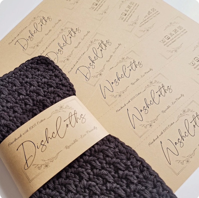 May include: A set of black crocheted dishcloths with a brown paper label that reads "Handmade with 100% Cotton Dishcloths Reusable - Eco Friendly".