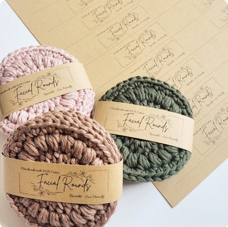 May include: Three crocheted facial rounds in pink, brown, and green. Each round has a brown paper label that reads "Handmade with 100% Cotton Facial Rounds Reusable - Eco Friendly".