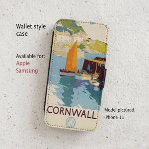May include: A wallet-style phone case featuring a vintage travel poster for Cornwall, England. The poster depicts a sailboat in a harbor with a seaside town in the background. The text "CORNWALL" is printed in large letters at the bottom of the poster. The case is available for Apple and Samsung phones. The model pictured is an iPhone 11.