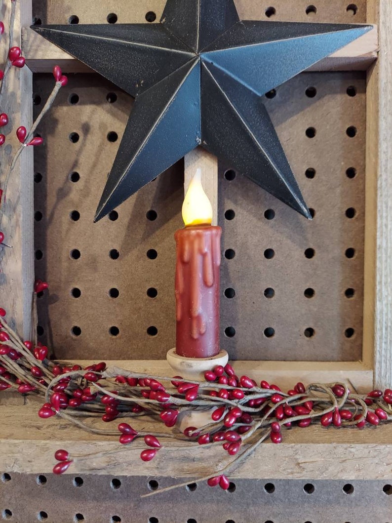 pip berry farm star Wooden window with battery timer candle