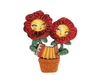 Brosche mit Blumen und Zieharmonika