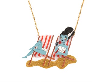 Elsa sitting in hammocks necklace