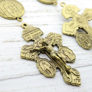 Crucifijo de indulgencia y medalla del Santo Rostro de Jesús, conjunto de piezas para rosario italiano, medalla de San Benito, medalla milagrosa de Nuestra Señora de las Gracias.